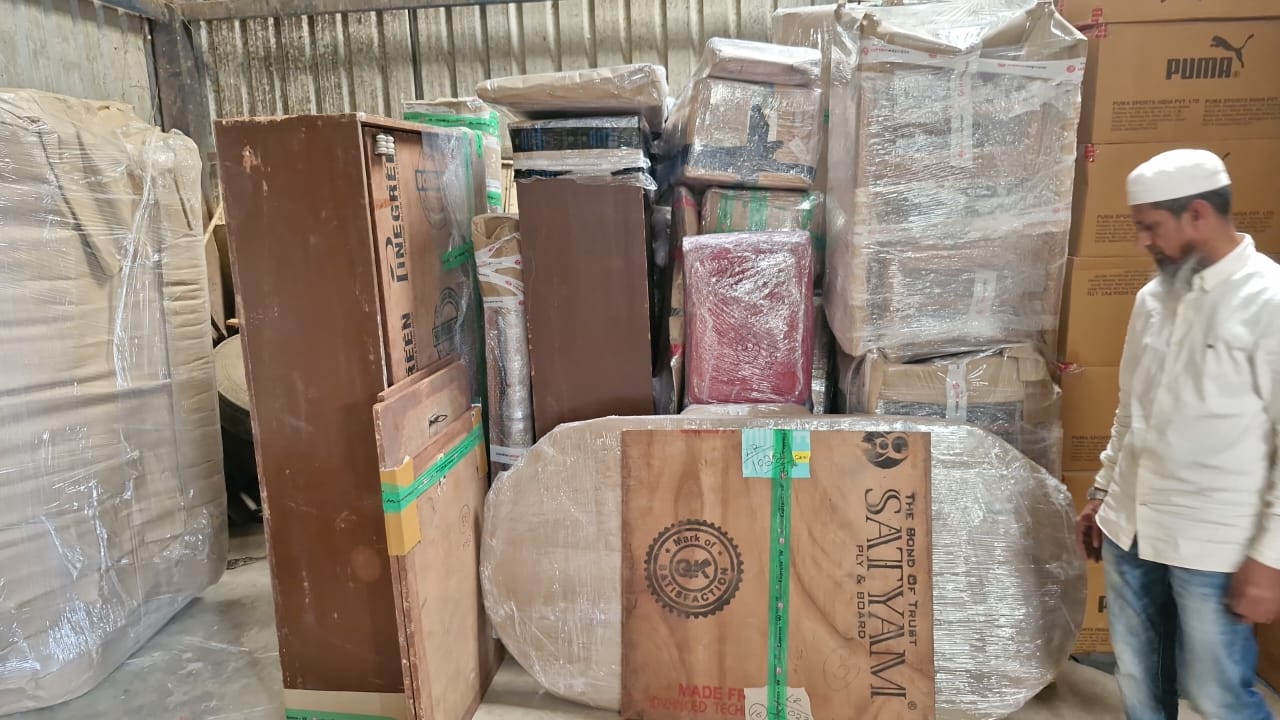 Furniture packed and wrapped for storage by Union Packers and Movers Bangalore